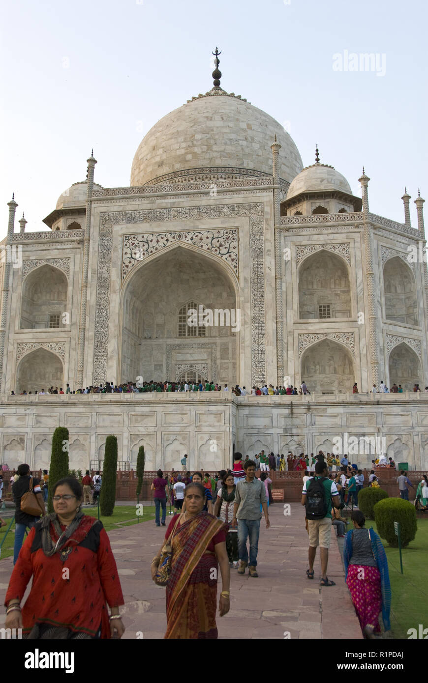 Indians visit the Taj Mahal, a white marble mausoleum in Agra, India built by Mughal emperor Shah Jahan in memory of his wife, Mumtaz Mahal. Stock Photo