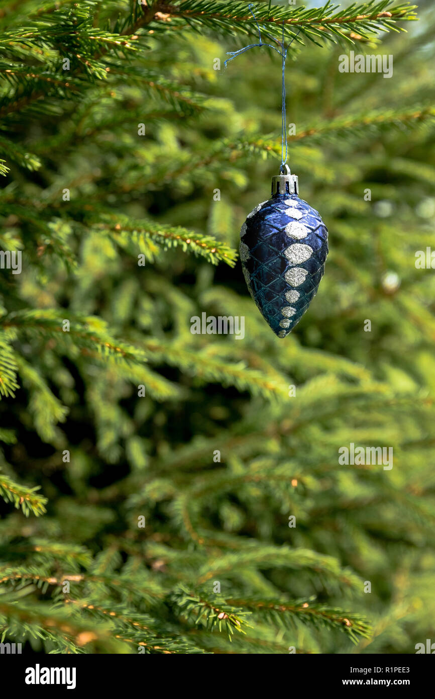 Beautiful blue color christmas decorations hanging on christmas tree ...