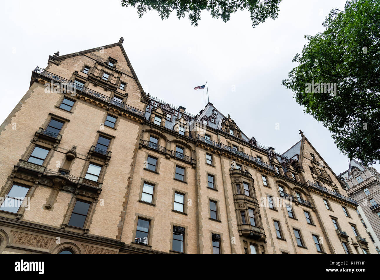 New York City, USA - June 23, 2018: Low angle view of The Dakota building in the Upper West Side of Manhattan. It was the home of John Lennon Stock Photo