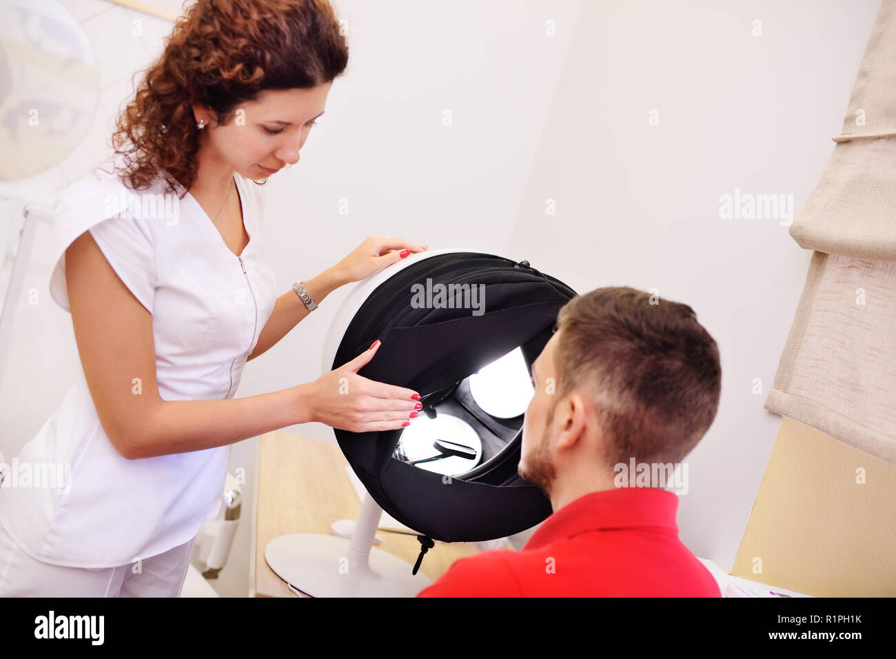 Skinologist Setup facial skin diagnostics equipment for dermatology and cosmetology. A ...