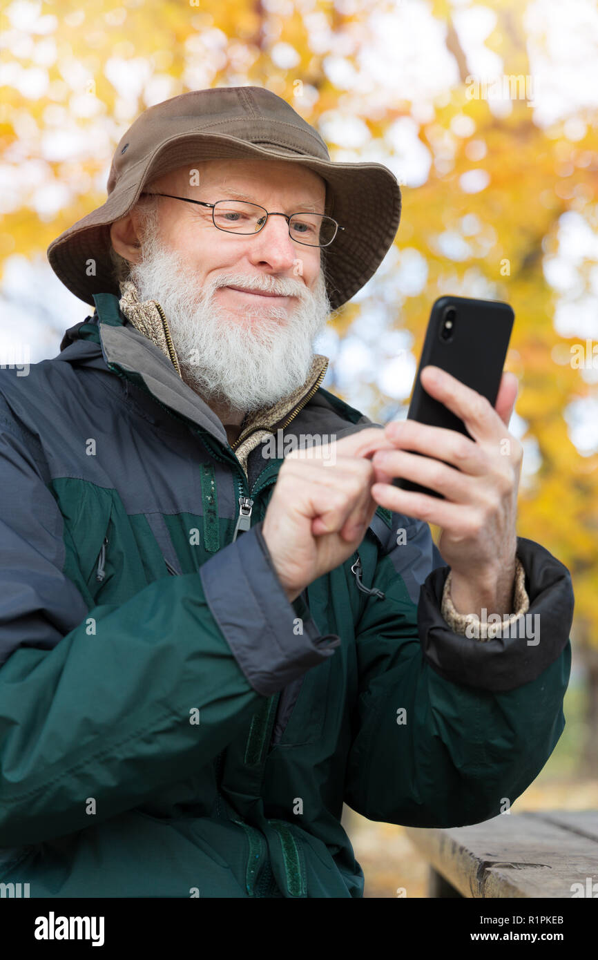 Texting man happy smartphone hi-res stock photography and images - Alamy