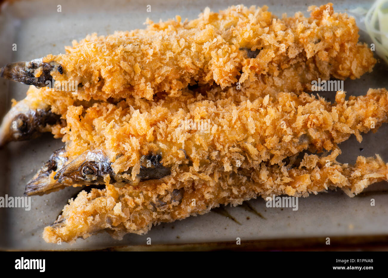 Shishamo fish deep fried serve with Japanese sauce style Stock Photo