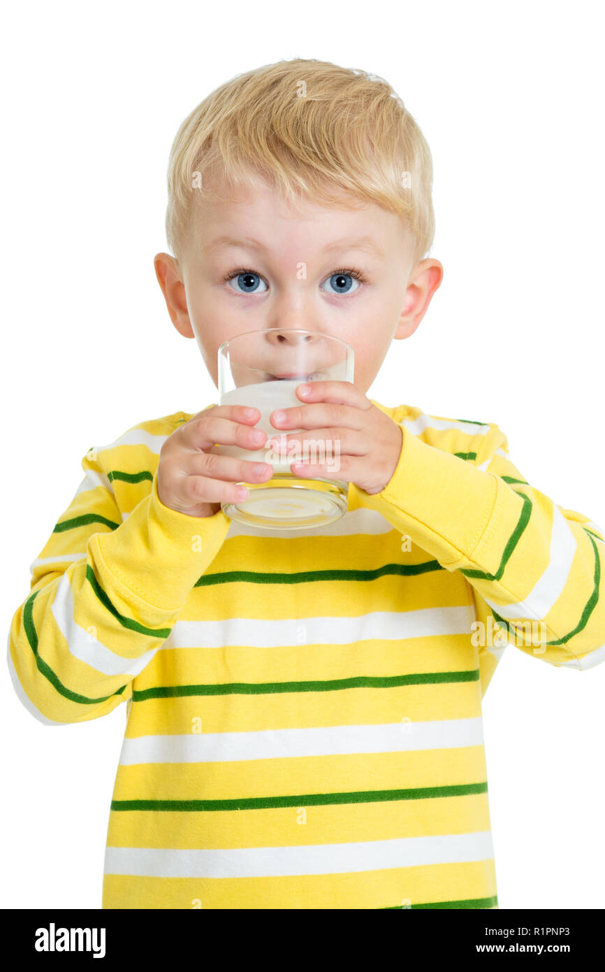Child boy drinking dairy product from glass isolated on white Stock