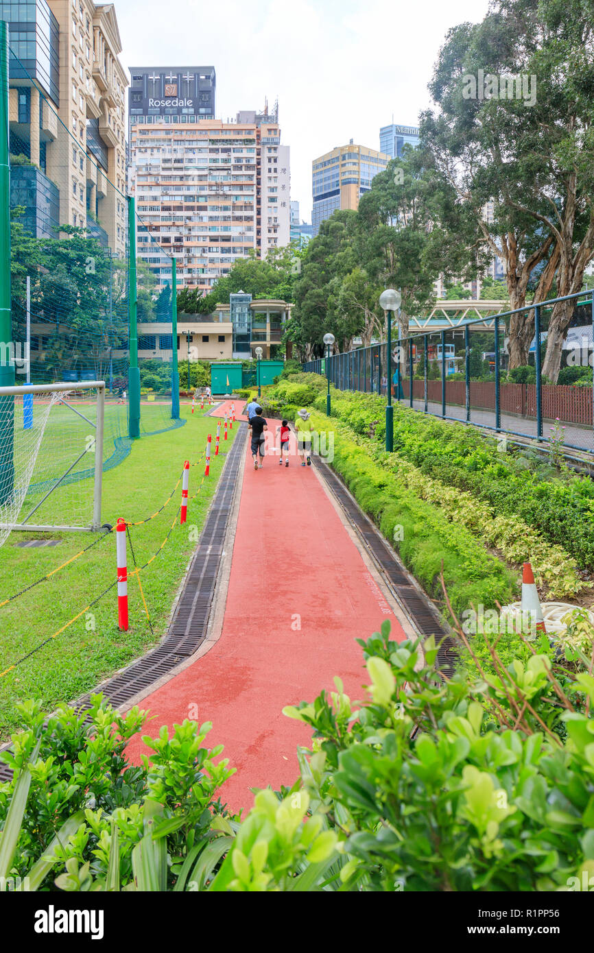 People Jogging At Victoria Park Hong Kong Stock Photo