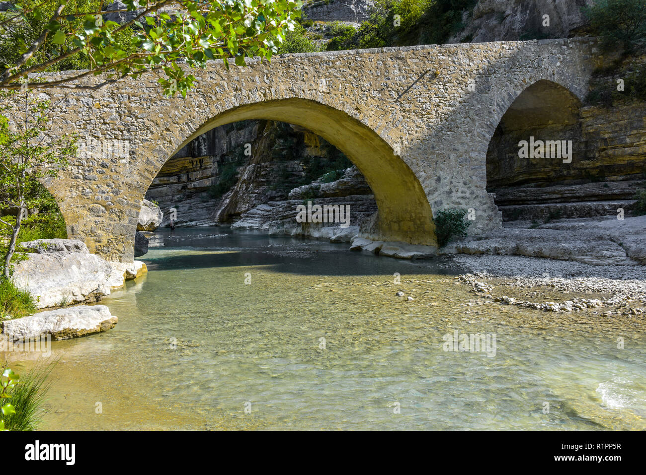 old stone bridge with arches, Provence, France, Gorges de la Méouge, region Provence-Alpes-Côte d'Azur Stock Photo