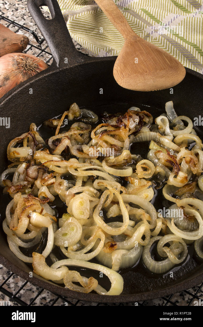caramelized organic onion rings in a cast iron pan Stock Photo Alamy