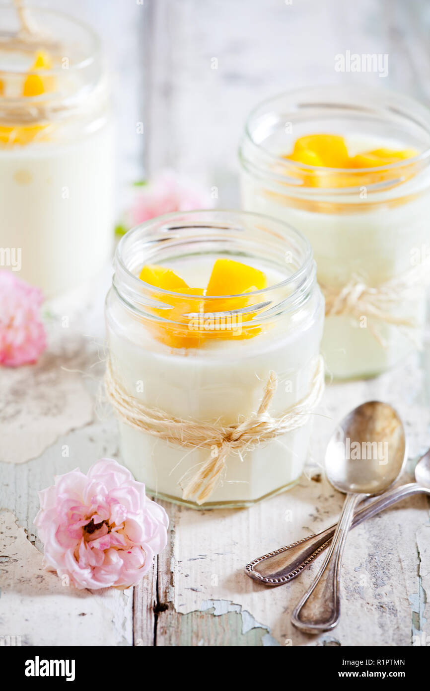 Jars of homemade vanilla pudding with rose extract Stock Photo Alamy