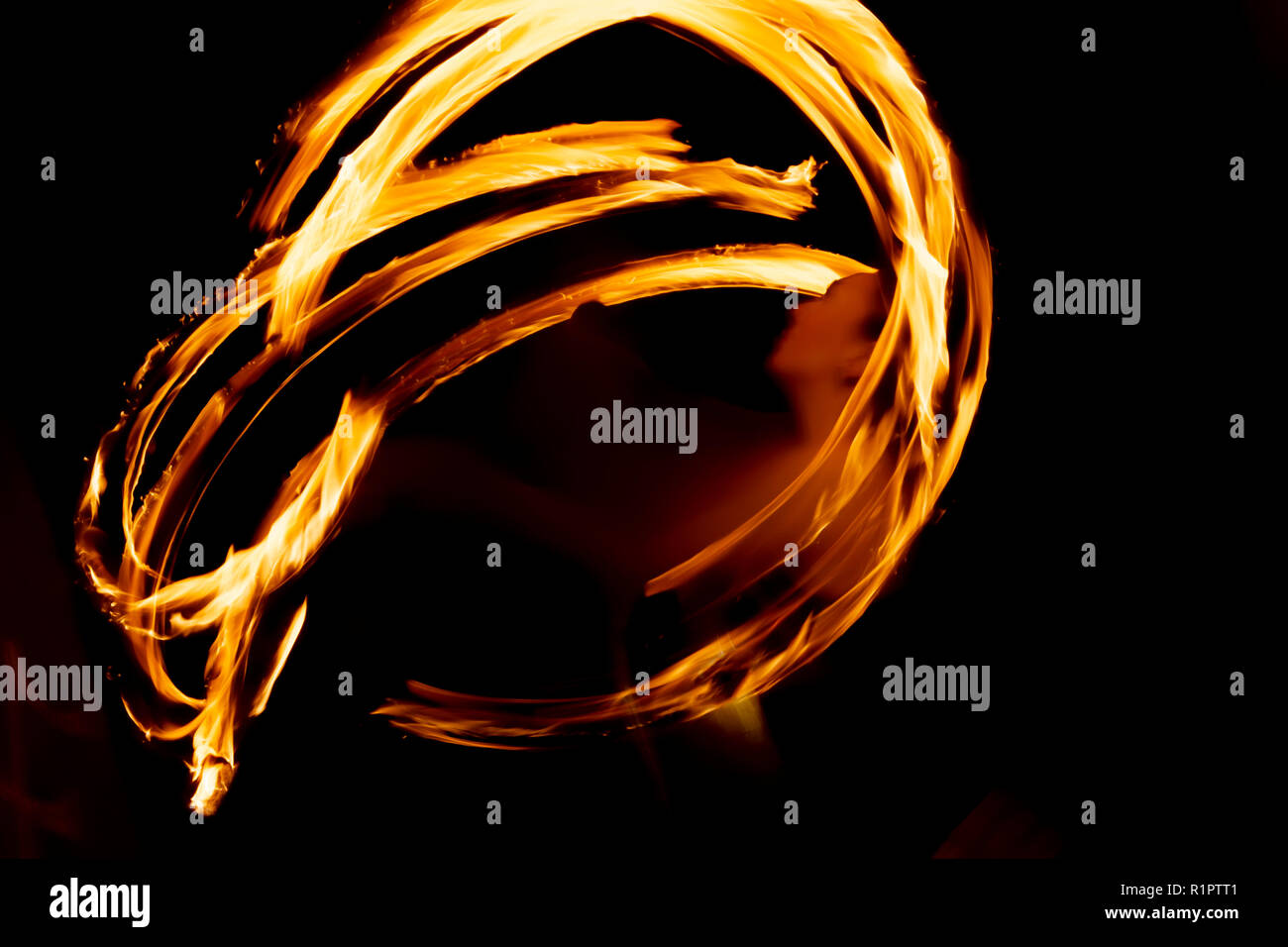 Fire poi slow shutter flame trails Stock Photo