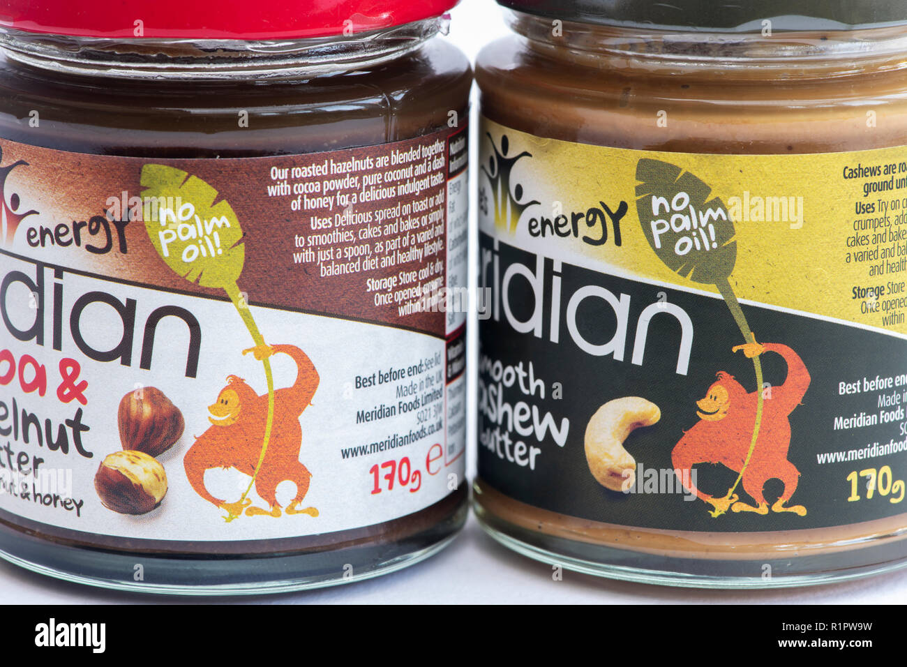 Meridian nut butter jars with No palm oil label Stock Photo