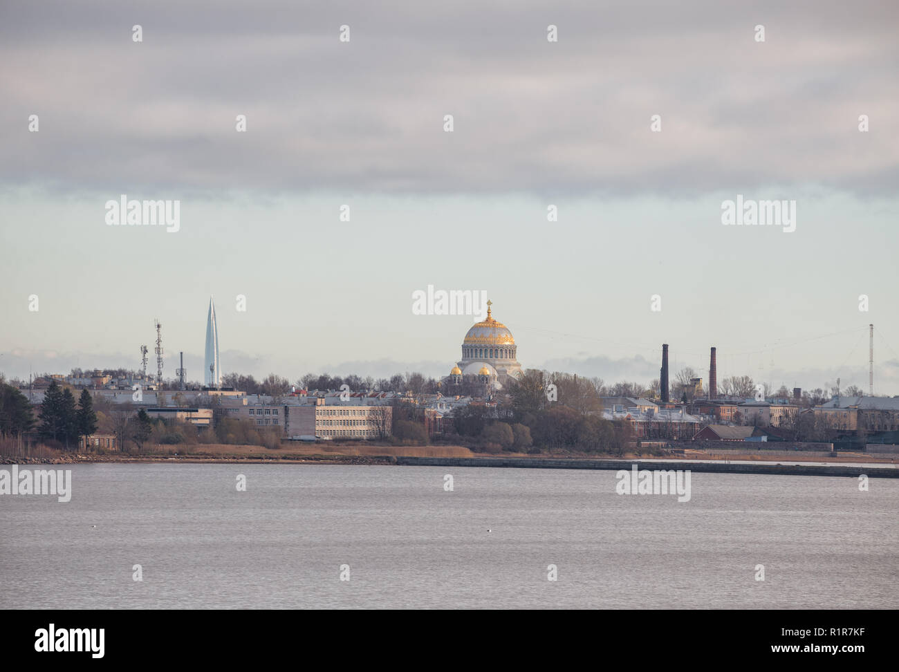 View of Kronstadt from the Gulf of Finland. Naval Cathedral and Lakhta Center skyscraper Stock Photo