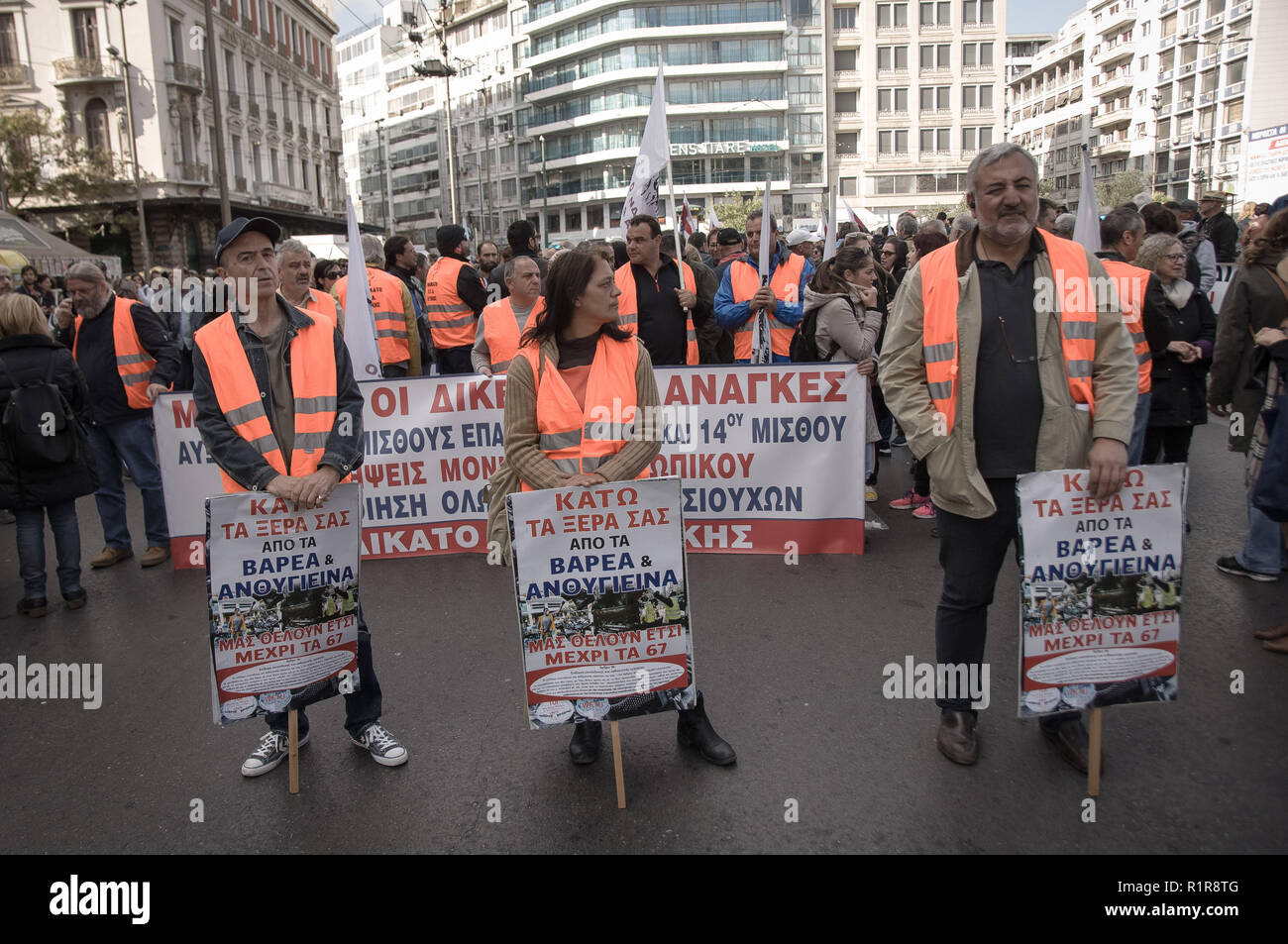 Protesters are seen holding placards during the strike. The demonstration marks the civil servants 24-hour strike against government's economic policies and high unemployment. Stock Photo