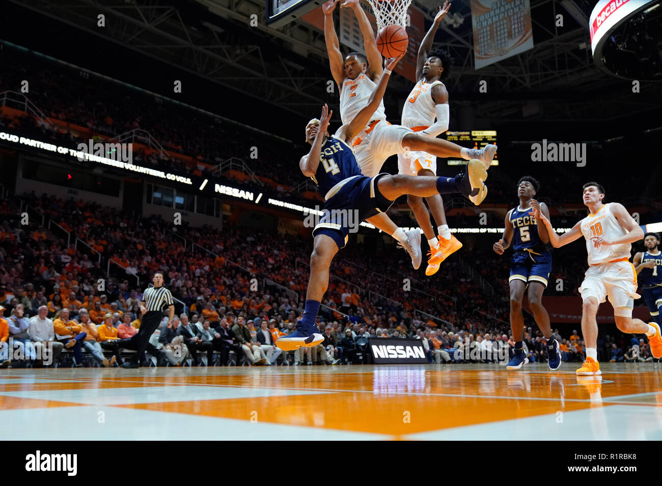 Knoxville, Tennessee, USA. 13th Nov, 2018. November 13, 2018: Brandon Alston #4 of the Georgia Tech Yellow Jackets is fouled by Grant Williams #2 of the Tennessee Volunteers during the NCAA basketball game between the University of Tennessee Volunteers and the Georgia Tech Yellow Jackets at Thompson Boling Arena in Knoxville TN Tim Gangloff/CSM Credit: Cal Sport Media/Alamy Live News Stock Photo