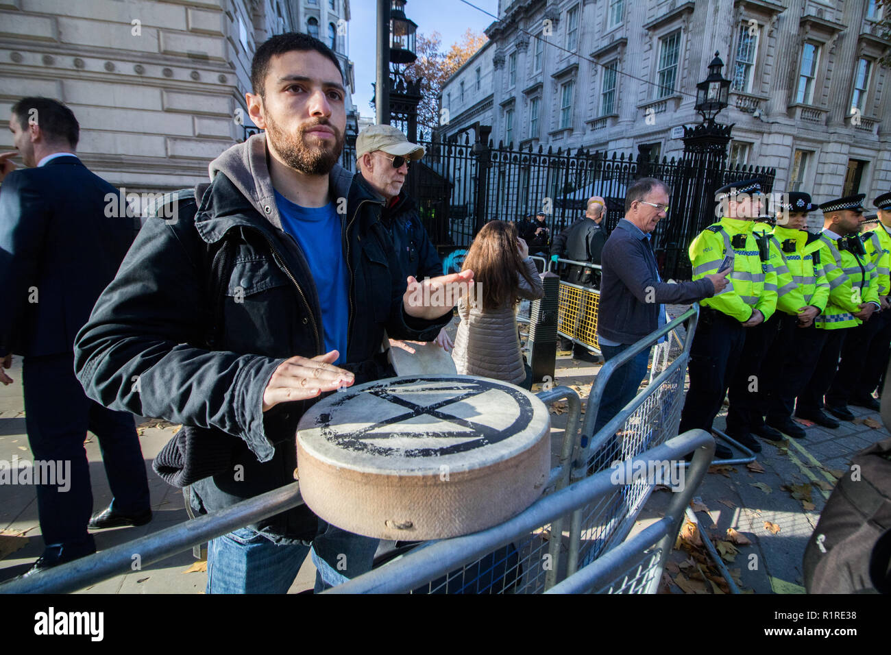 London UK. 14th November 2018. Police form barriers as Extinction Rebellion climate activists protest outside Downing Street Credit: amer ghazzal/Alamy Live News Stock Photo