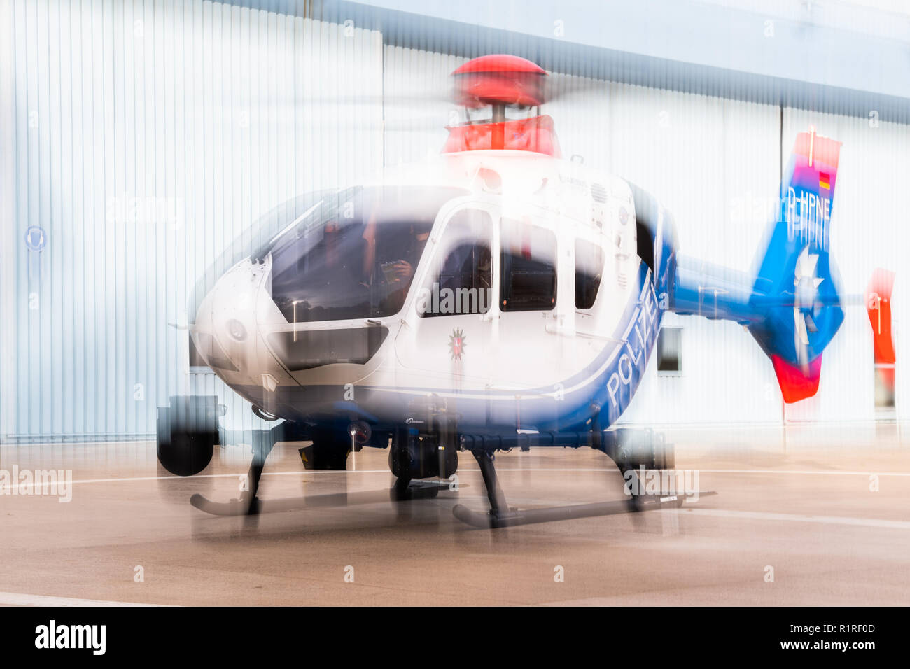 Rastede, Germany. 14th Nov, 2018. A view of a helicopter of the police of Lower Saxony taking off (picture taken by a longer exposure time). Credit: Mohssen Assanimoghaddam/dpa/Alamy Live News Stock Photo
