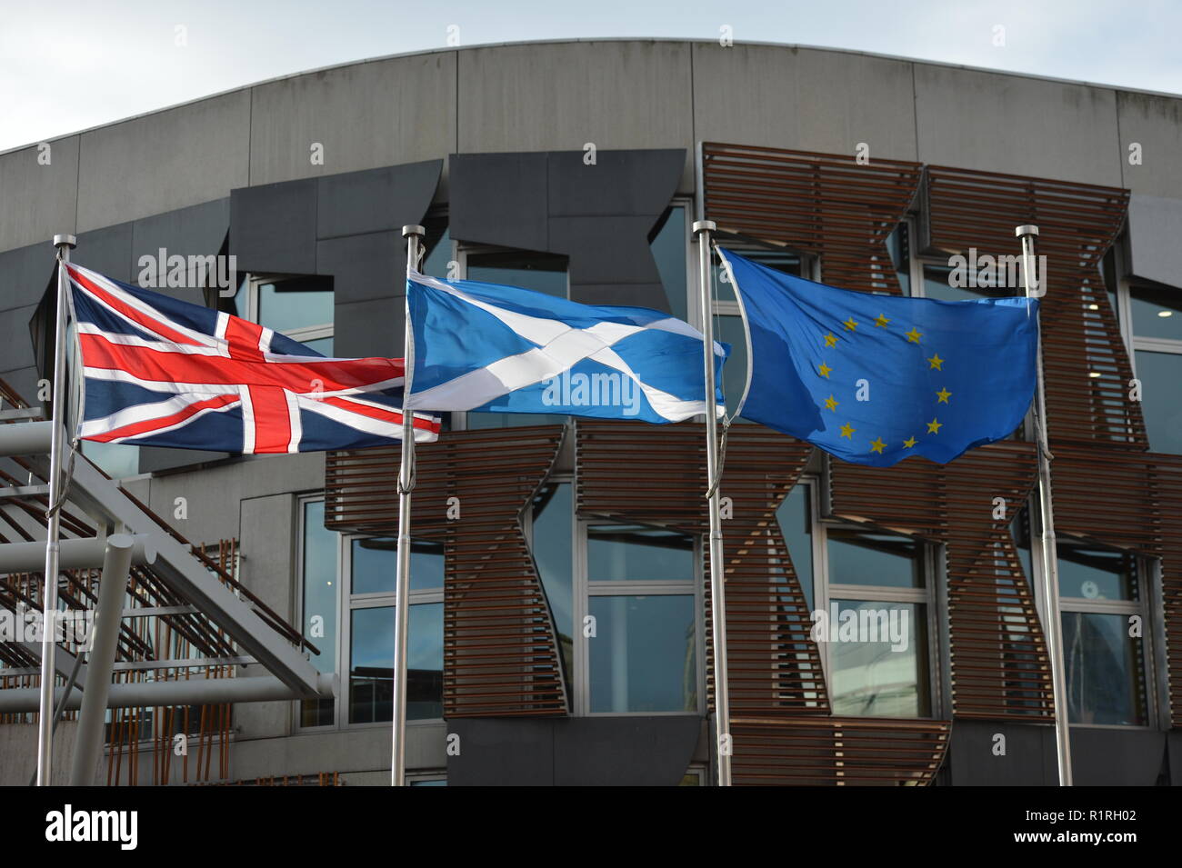Edinburgh, UK. 14th Nov, 2018. As Theresa May's government try to push through a final deal for last minute plans, the flags flying or not flying outside the Scottish Parliament in Edinburgh might be saying otherwise as Scotland's First Minister Nicola Sturgeon tries every attempt to put a halt to May's plans. Credit: Colin Fisher/Alamy Live News Stock Photo