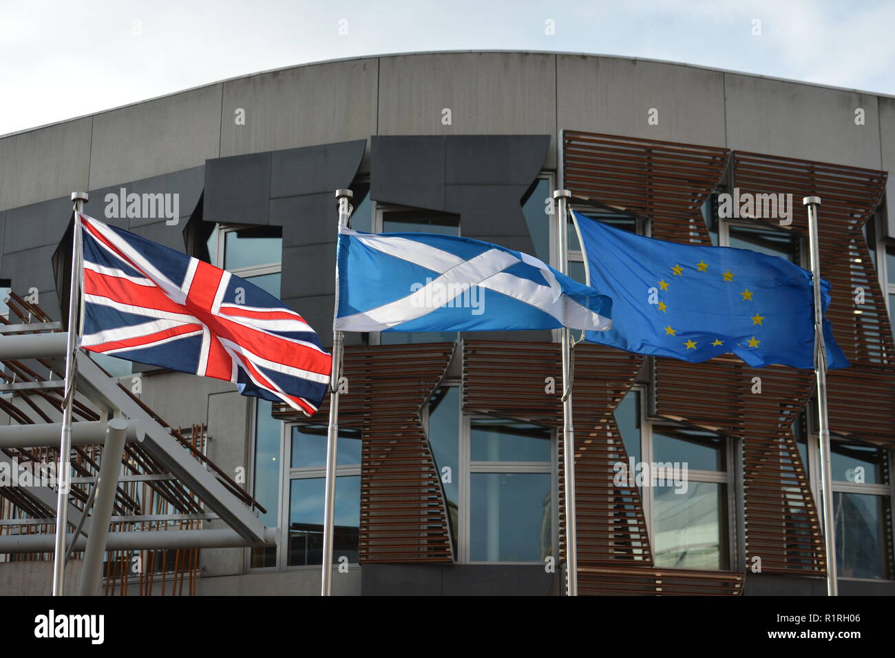 Edinburgh, UK. 14th Nov, 2018. As Theresa May's government try to push through a final deal for last minute plans, the flags flying or not flying outside the Scottish Parliament in Edinburgh might be saying otherwise as Scotland's First Minister Nicola Sturgeon tries every attempt to put a halt to May's plans. Credit: Colin Fisher/Alamy Live News Stock Photo