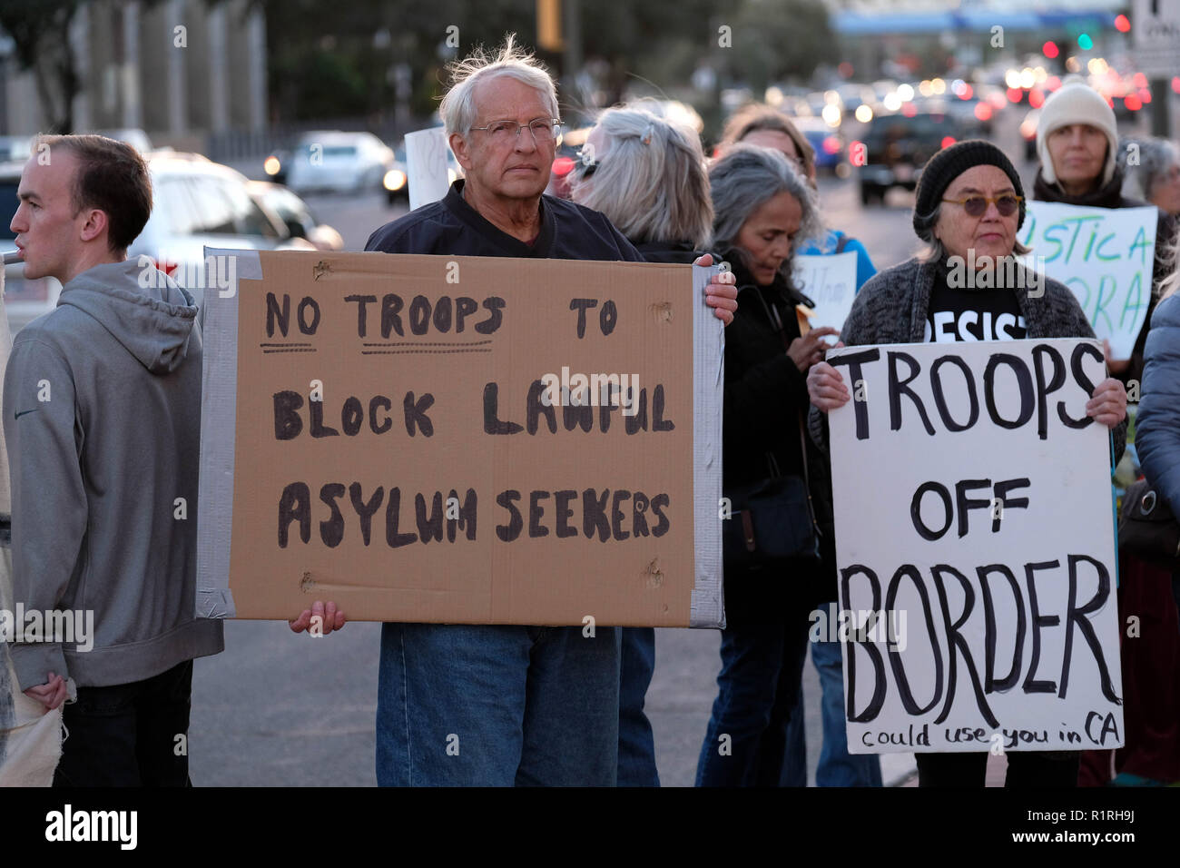 Tucson, Arizona, USA. 13th Nov, 2018. Pro immigrants rights protest in Tucson in support of the migrant caravan traveling through Mexico towards the US border. They denounced the stationing of US troops by President Trump on the border to hault the caravan if they reach the Arizona and support the migrants rights to apply for asylum. Credit: Christopher Brown/ZUMA Wire/Alamy Live News Stock Photo