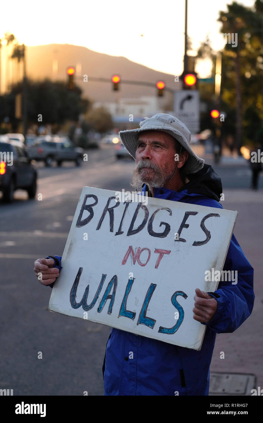 November 13, 2018 - Tucson, Arizona, USA - Pro immigrants rights protest in Tucson in support of the migrant caravan traveling through Mexico towards the US border. They denounced the stationing of US troops by President Trump on the border to hault the caravan if they reach the Arizona and support the migrants rights to apply for asylum. (Credit Image: © Christopher Brown/ZUMA Wire) Stock Photo