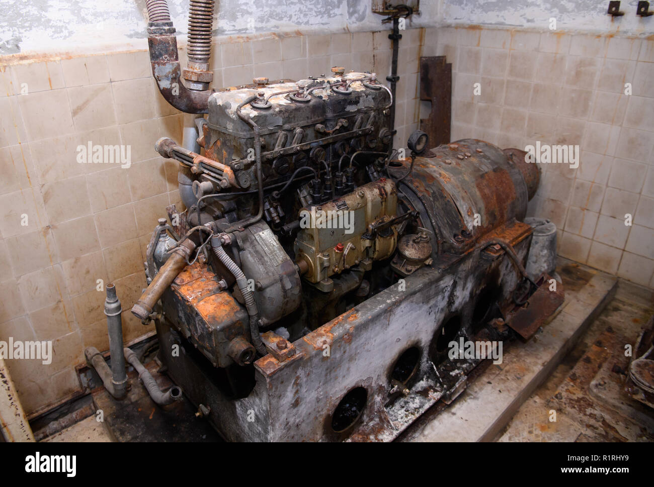 Pullach, Germany. 09th Nov, 2018. An old diesel generator stands in a bunker under the presidential villa on the premises of the Federal Intelligence Service (BND). The villa was once the residence of Martin Bormann, head of the party office of the NSDAP and a confidant of Hitler, and belonged to the former Reichssiedlung Rudolf Heß, which was built between 1936 and 1938. From 1947, the buildings were used by the Gehlen organization and later by the Federal Intelligence Service (BND). Credit: Sven Hoppe/dpa/Alamy Live News Stock Photo
