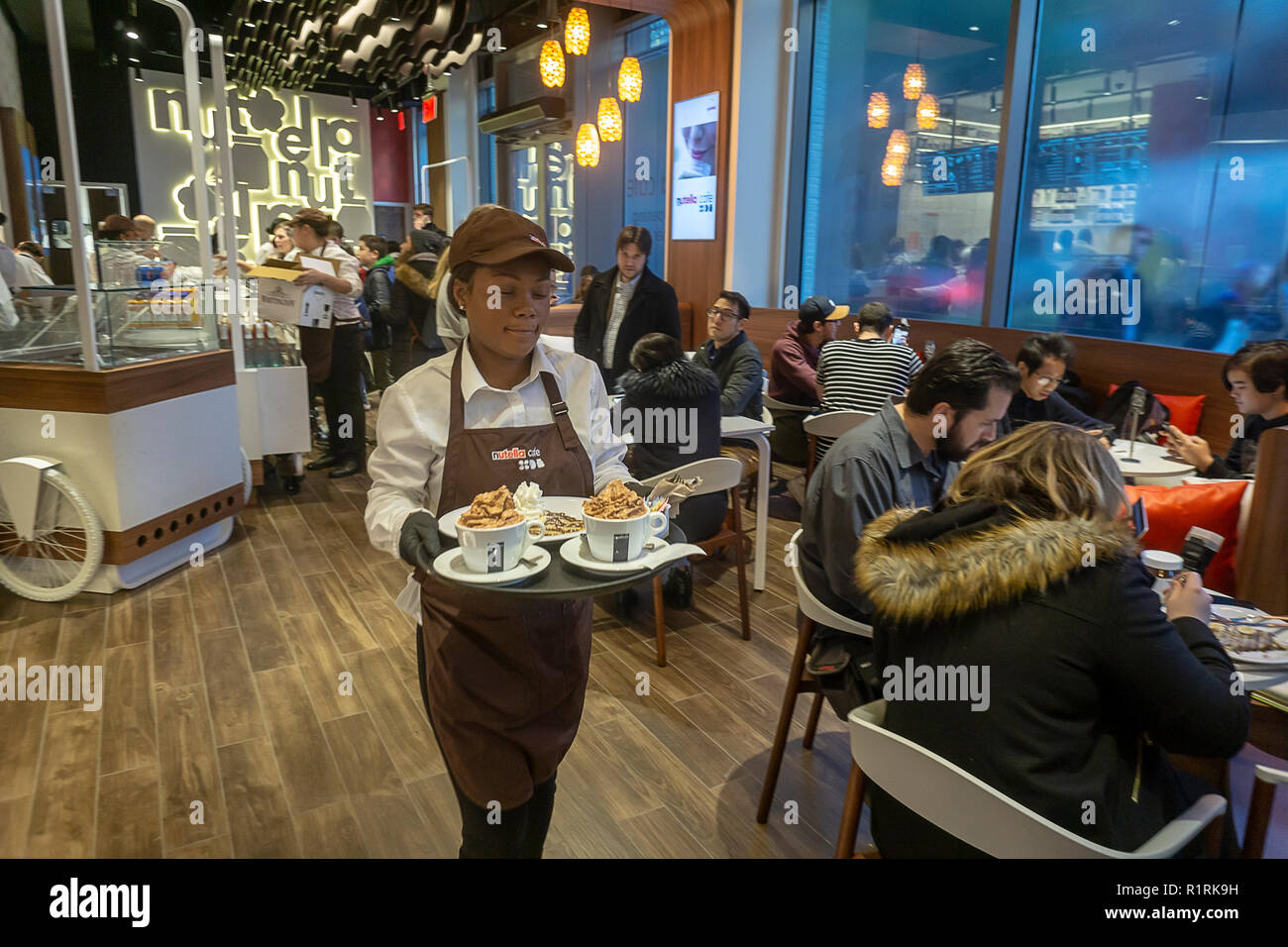New York, USA. 14th Nov 2018. Nutella lovers flock to the grand opening of  the Nutella Cafe in the Greenwich Village neighborhood of New York on  Wednesday November 14, 2018. This is