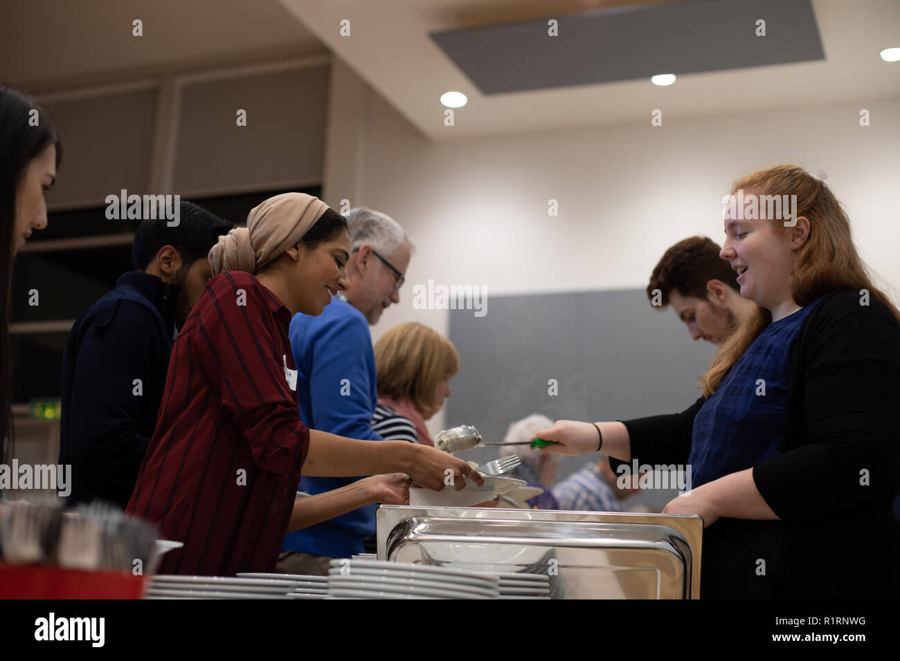 Cheltenham, UK. 14th Nov 2018.. People getting food Credit: Victor Storublev/Alamy Live News Stock Photo