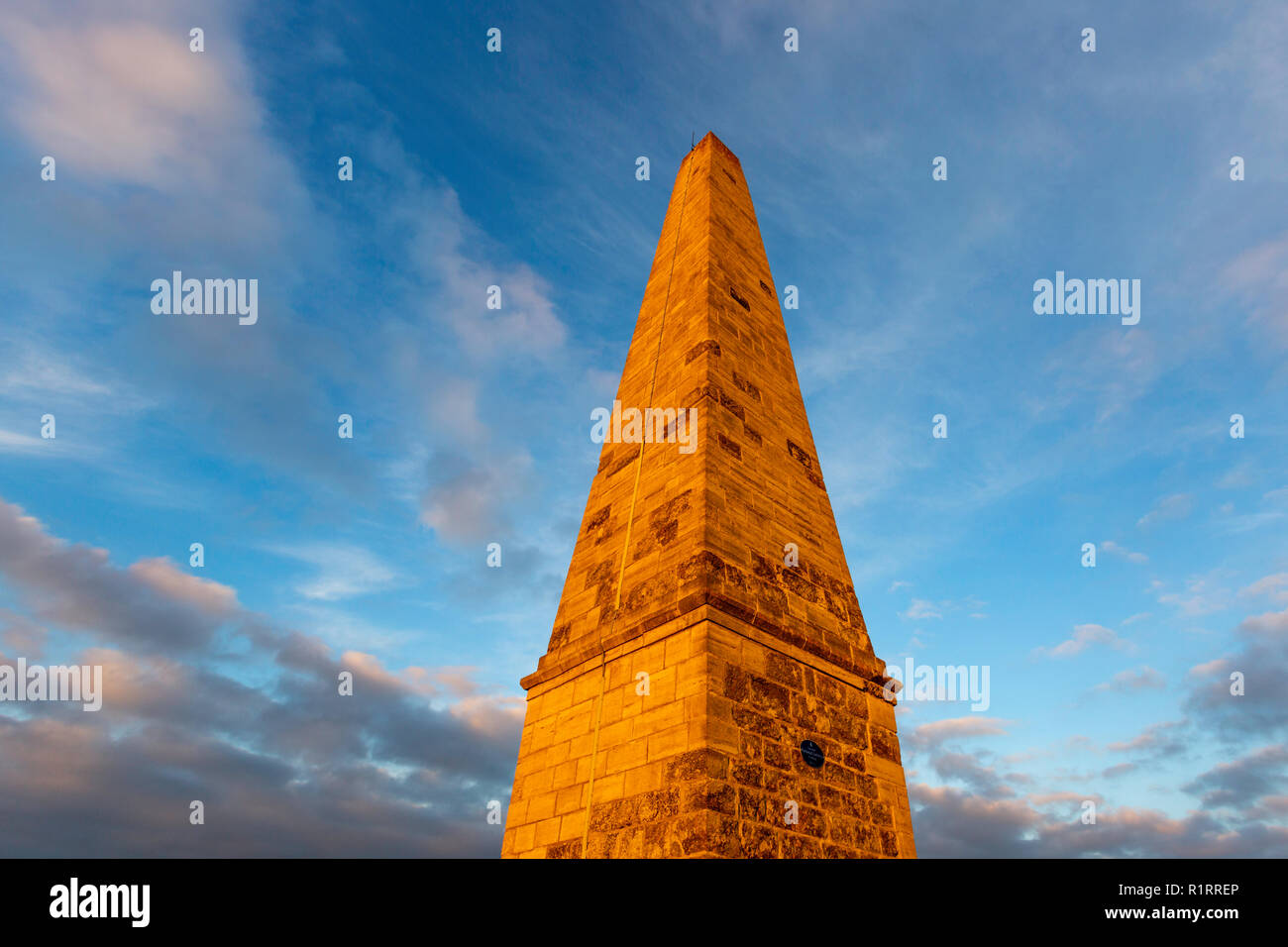 The Bilsington Obelisk, also known as The Cosway Monument. 16m tall and stands in a field in Bilsington between Ashford and Romney Marsh. Stock Photo
