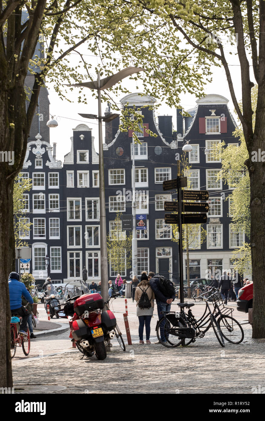 Amsterdam, Netherlands - April 20, 2017: Traditional historic Dutch gable houses l in Amsterdam The Netherlands Stock Photo