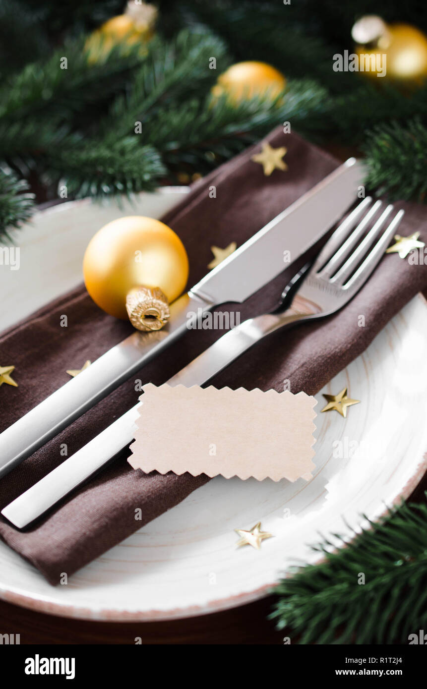 Christmas table place setting in vintage or rustic style. Stock Photo