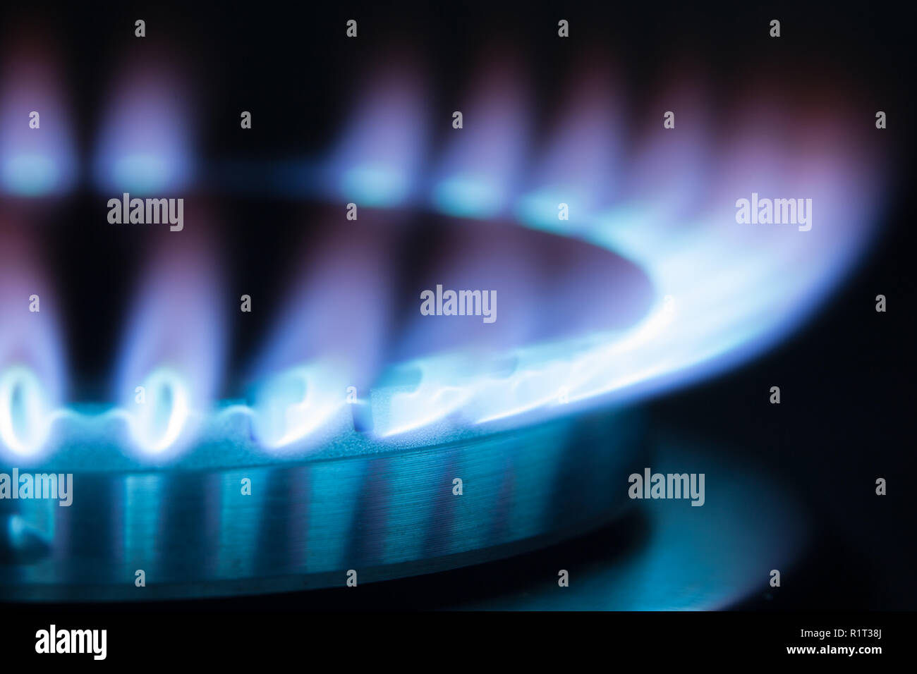 Gas burning in the burner of gas oven Stock Photo