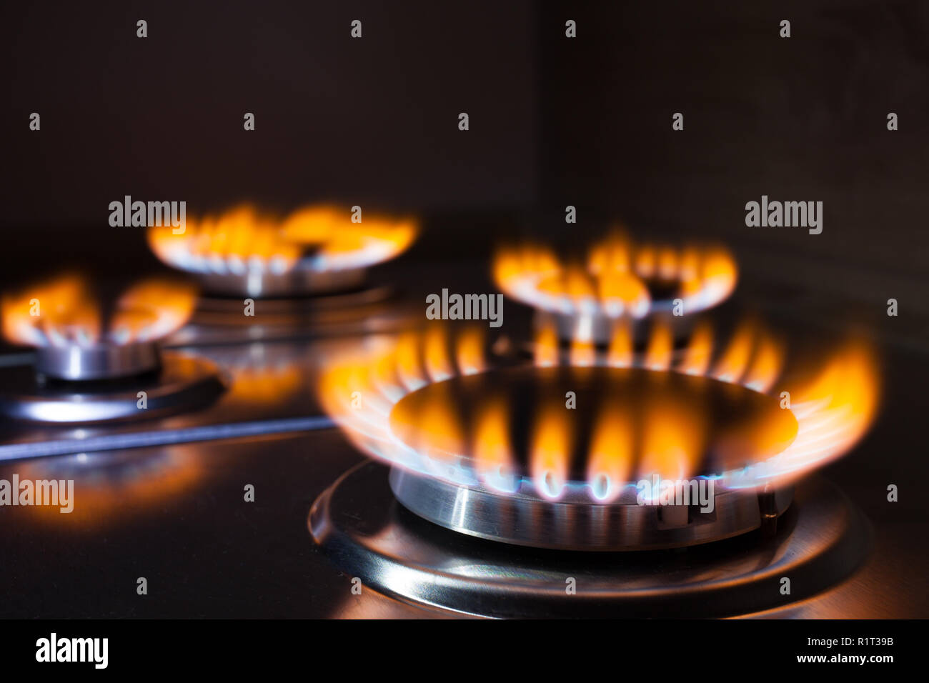 Gas burning in the burner of gas oven Stock Photo - Alamy