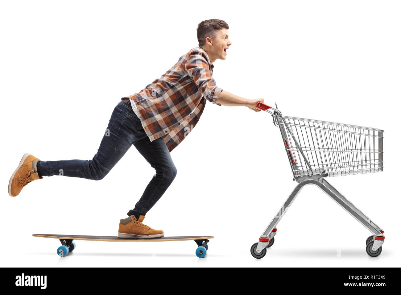 Full length shot of a young guy riding a longboard and pushing an empty