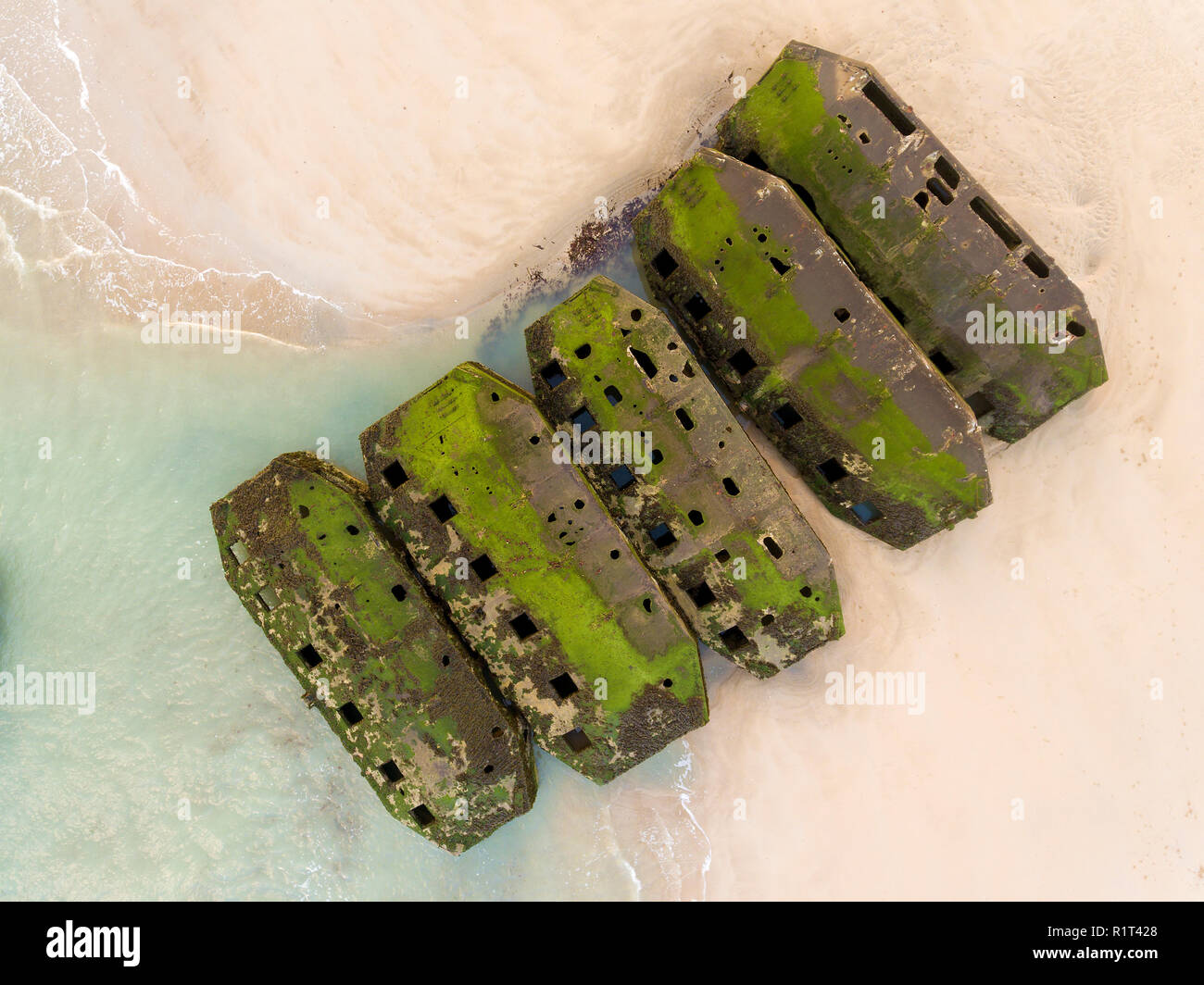Remains of Mulberry Artificial Harbour from D-Day invasion, Arromanches les Bains, Normandy, France Stock Photo
