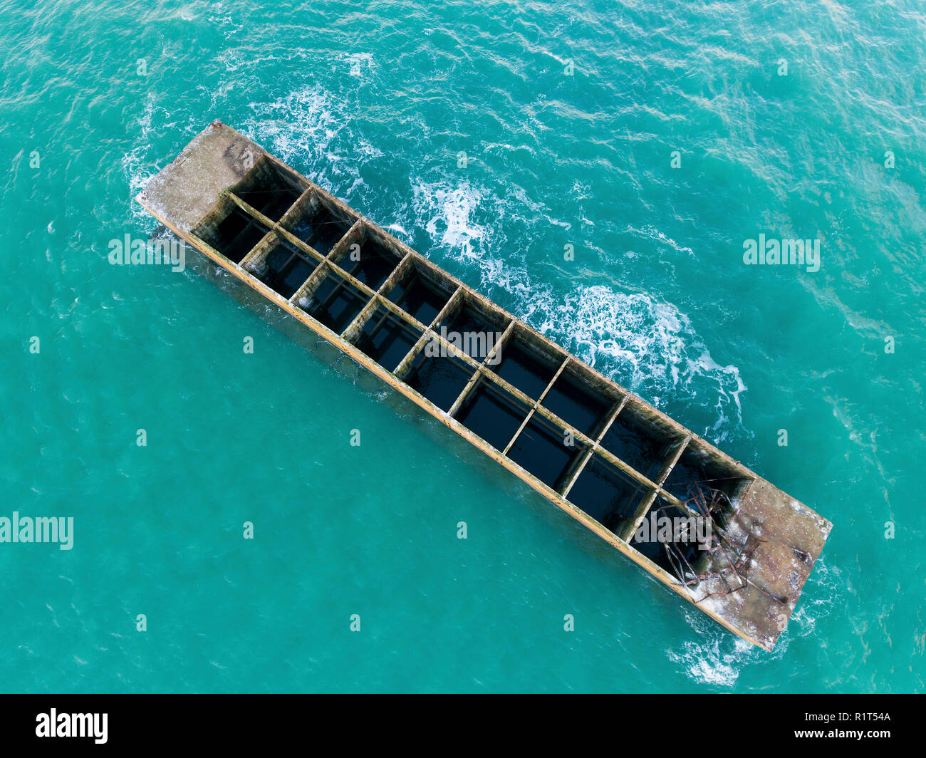 Remains of Mulberry Artificial Harbour from D-Day invasion, Arromanches les Bains, Normandy, France Stock Photo