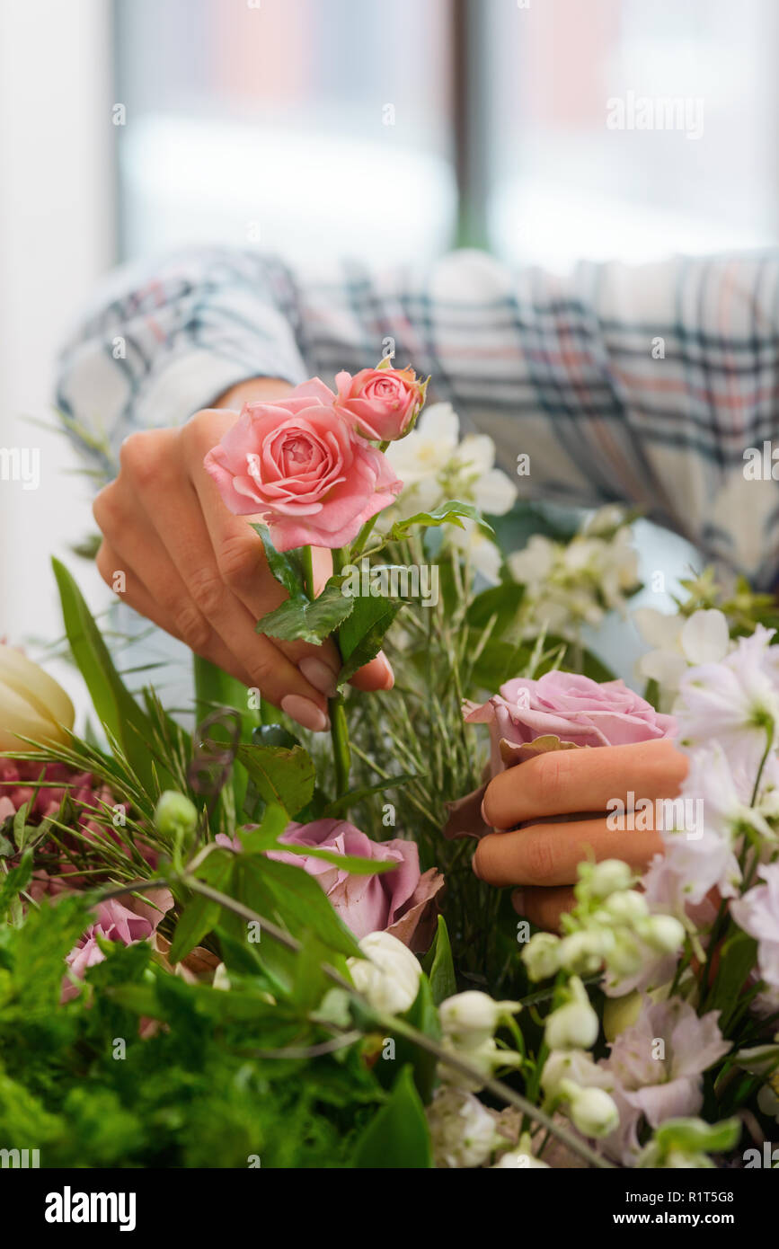 Female florist creating flower composition hi-res stock photography and ...