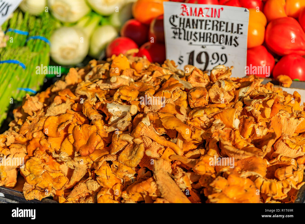Fresh wild chanterelle mushrooms for sale at Pike Place Market in Seattle, Washington Stock