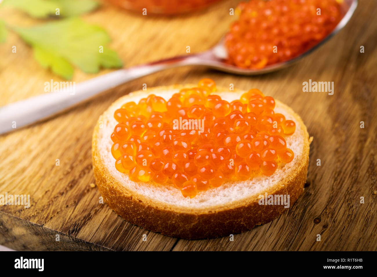 caviar snacks - red fish roe on the bread Stock Photo