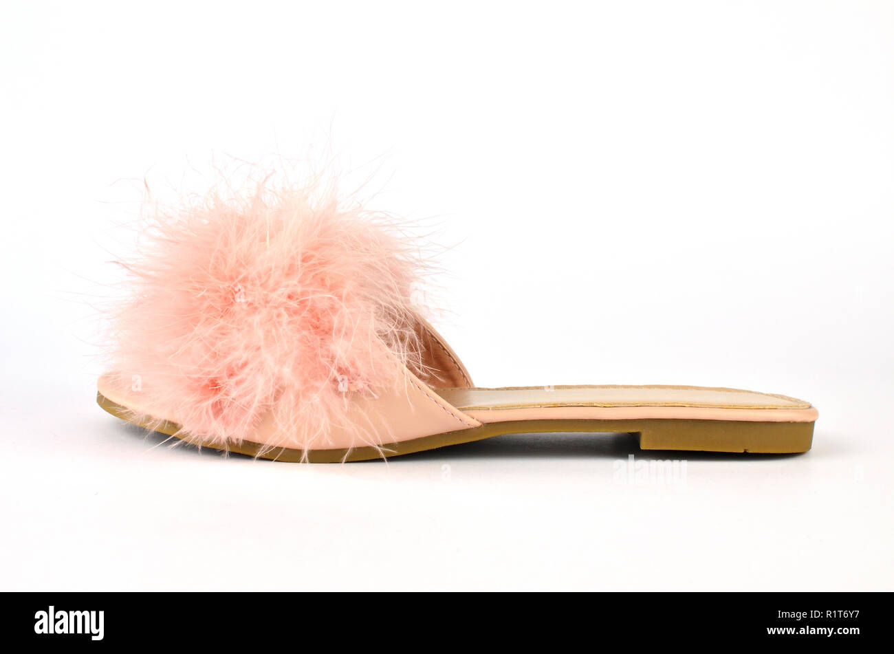 Flat pink feather slipper on white background Stock Photo - Alamy