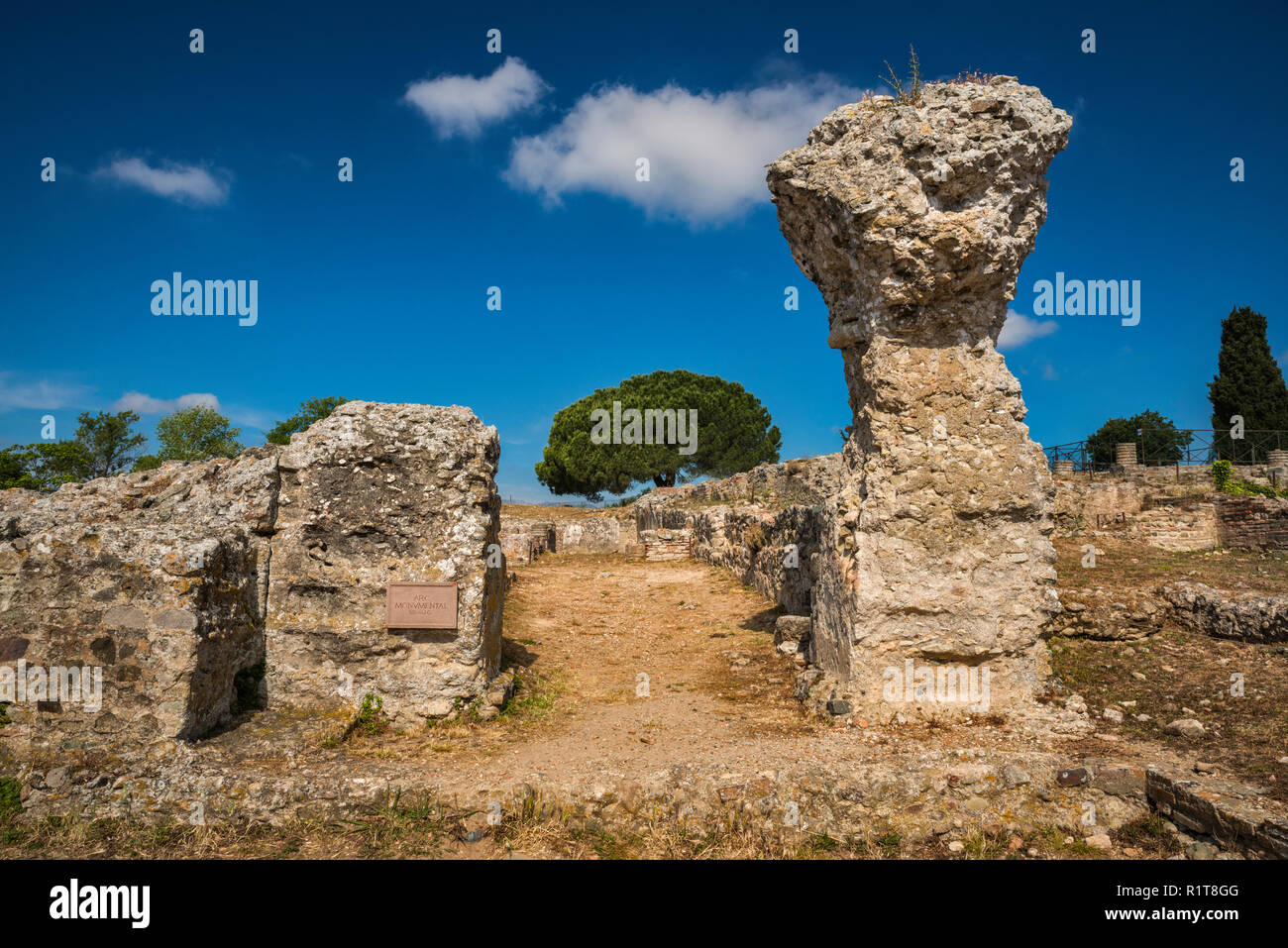 Arc Monumental, 1st century, at Roman settlement ruins, archaeological site in Aleria, Haute-Corse, Corsica, France Stock Photo