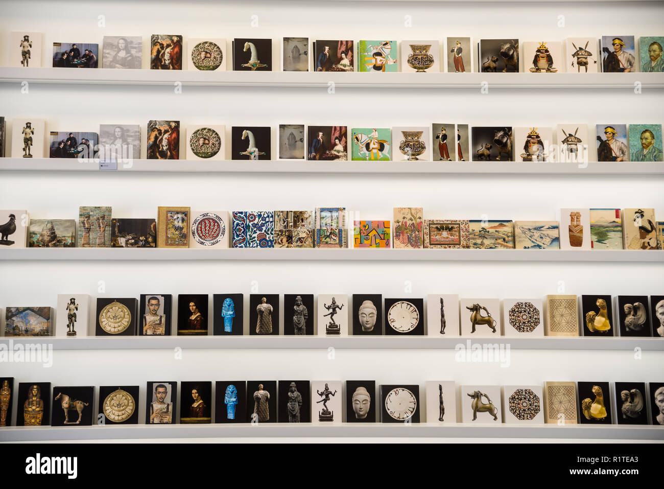 Historical books and cover of the art books displayed at Louvre Abu Dhabi, UAE Stock Photo