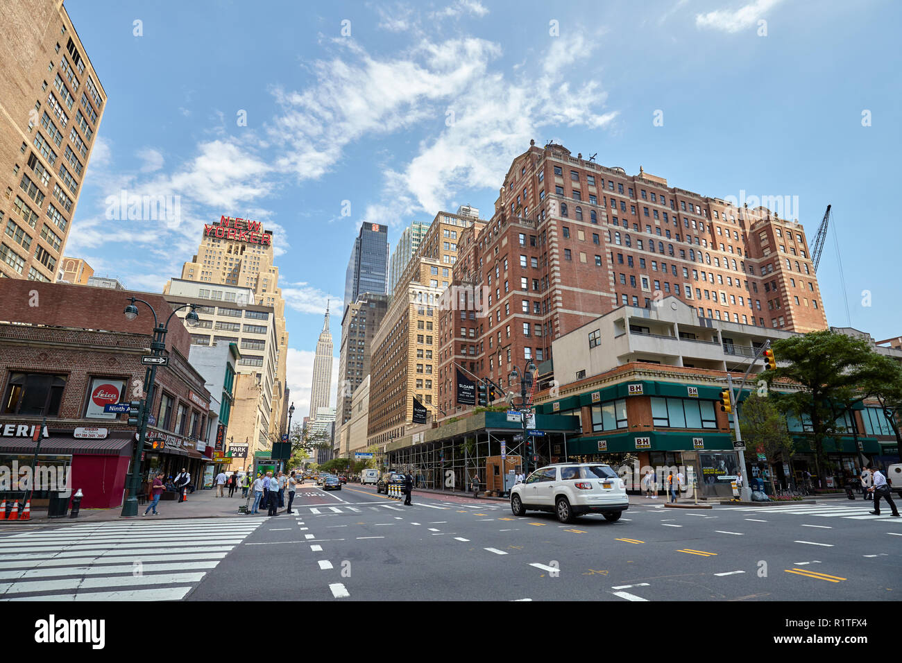 New York, USA - June 28, 2018: City life in the 'Big Apple', this nickname for New York City first introduced in the 1920s by John J. Fitz Gerald. Stock Photo