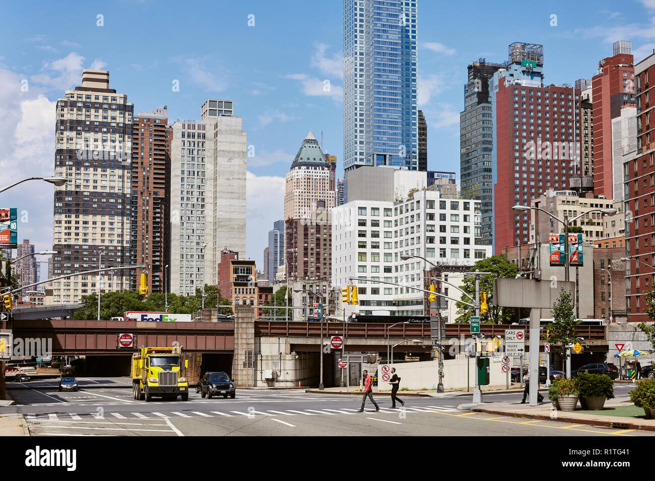 New York, USA - June 28, 2018: City life in the 'Big Apple', this nickname for New York City first introduced in the 1920s by John J. Fitz Gerald. Stock Photo