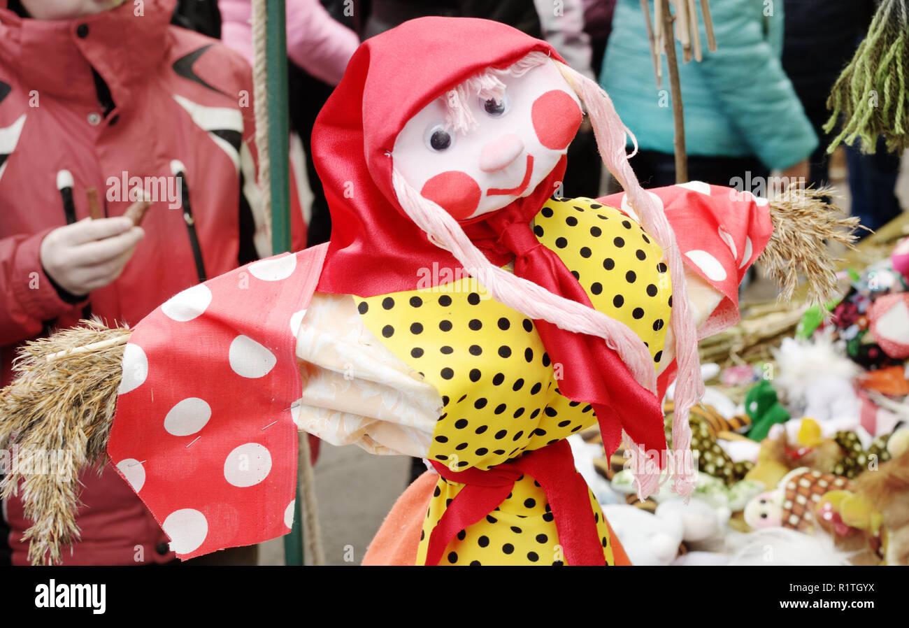 Straw dolls handed out to people at the festival of farewell to winter Stock Photo Alamy