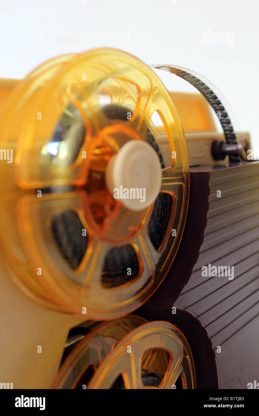 Plastic toy movie projector with reels and film, detail Stock Photo - Alamy