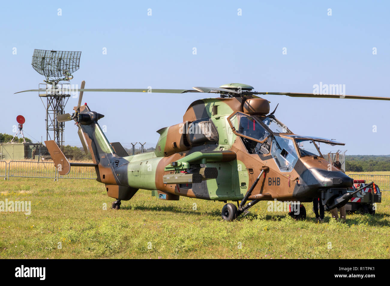 NANCY, FRANCE - JUL 1, 2018: French Army Eurocopter-Airbus EC665 Tigre attack helicopter in the grass of Nancy airbase. Stock Photo