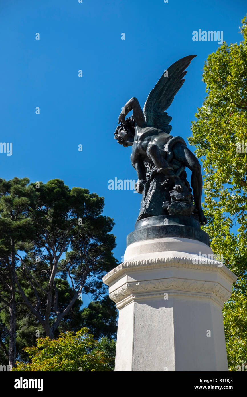 Statue of the Fallen Angel on a roundabout in the Retiro Park, Madrid