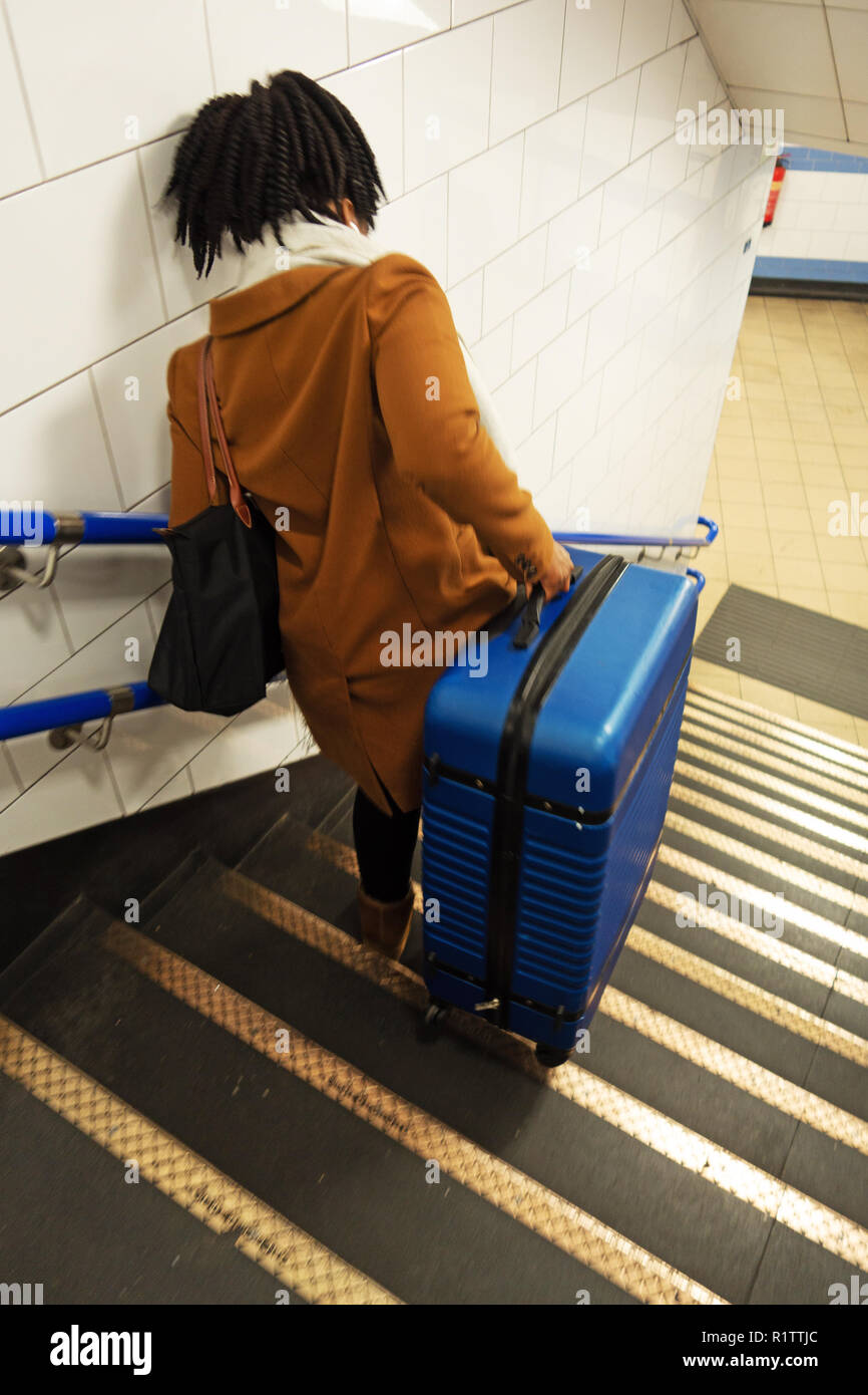 Heavy suitcase stairs hires stock photography and images Alamy