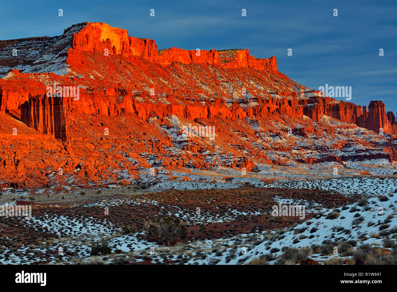 Red rock formations with snow in winter near sunset, Colorado Riverway Recreation Area, Utah, USA Stock Photo