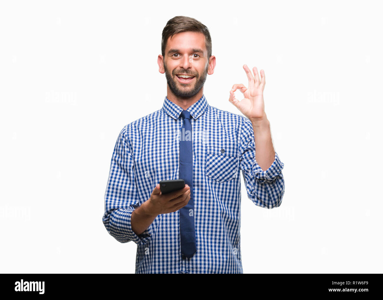 Young hadsome man texting sending message using smartphone over ...