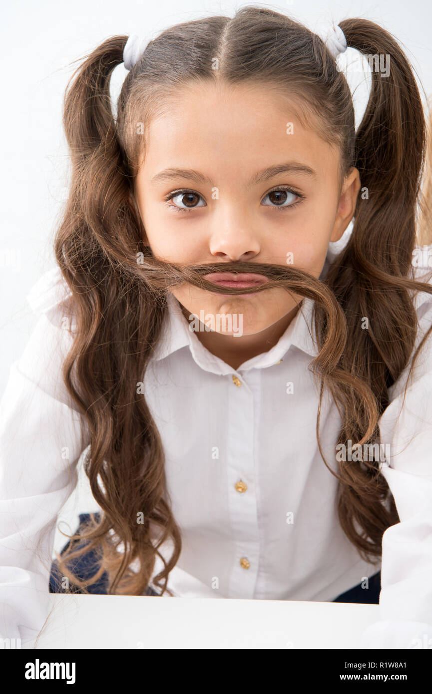 small girl with funny mustache. Small girl with long hair style Stock Photo  - Alamy