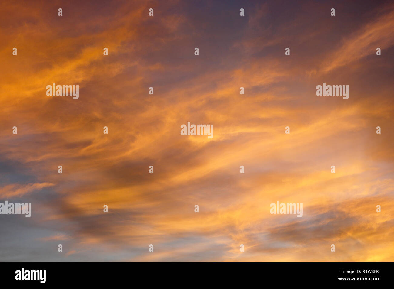 Orange Clouds at sunset Stock Photo